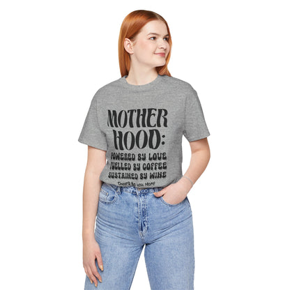 "Motherhood: powered by love, fuelled by coffee, sustained by wine. Cheers to you, Mom!" - Unisex Jersey Short Sleeve Tee