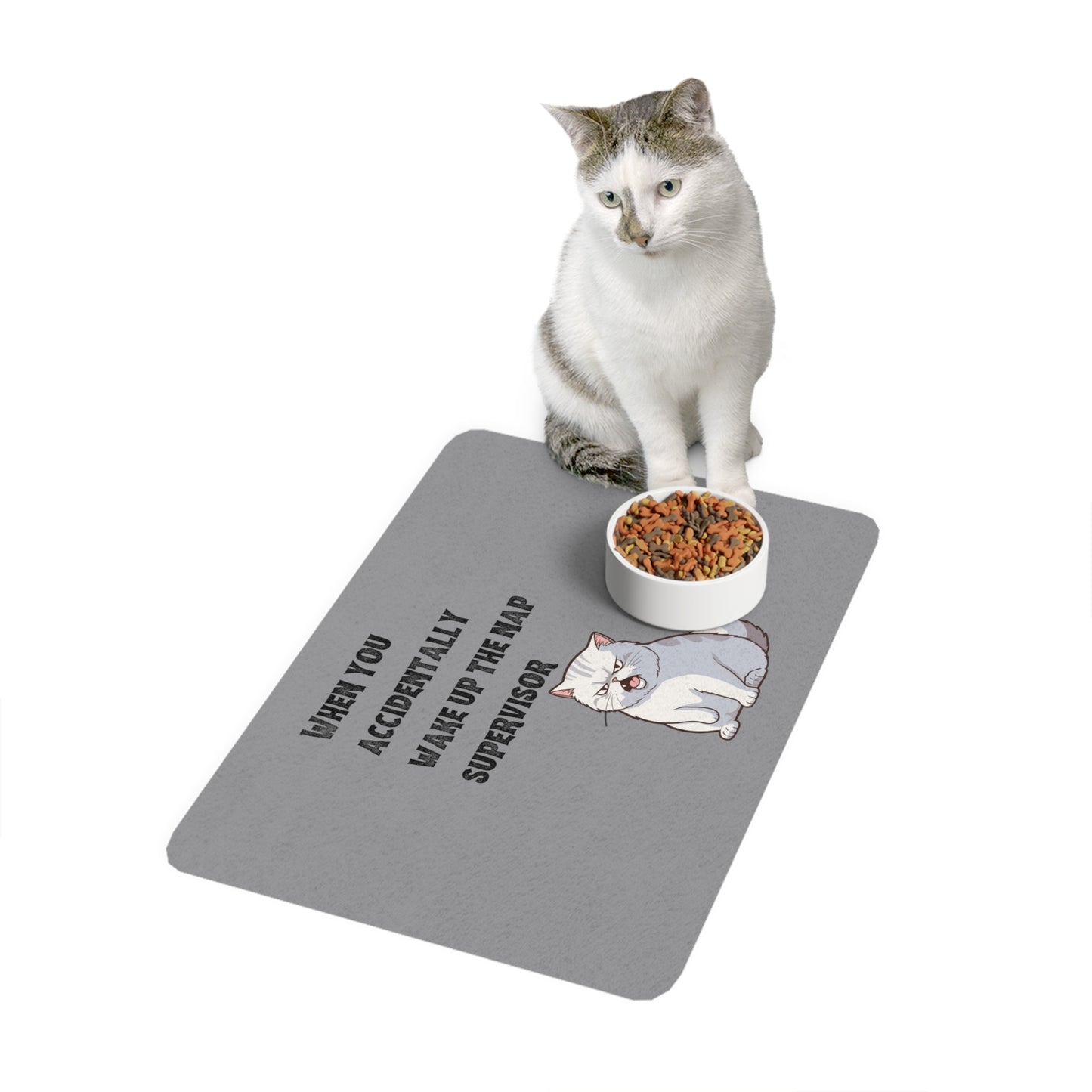 "When you accidentally wake up the nap supervisor" Cat Meme - Pet Food Mat (12x18)