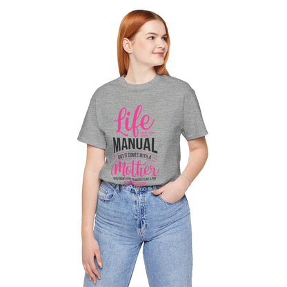 "Life doesn't come with a manual, but it comes with a mother who knows how to navigate it like a pro. Happy Mother's Day!" - Unisex Jersey Short Sleeve Tee