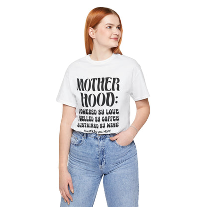 "Motherhood: powered by love, fuelled by coffee, sustained by wine. Cheers to you, Mom!" - Unisex Jersey Short Sleeve Tee