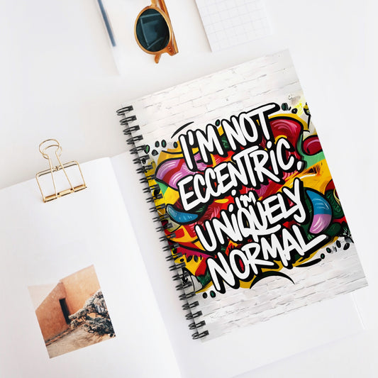 "I'm Not Eccentric; I'm Uniquely Normal." Spiral Notebook - Ruled Line